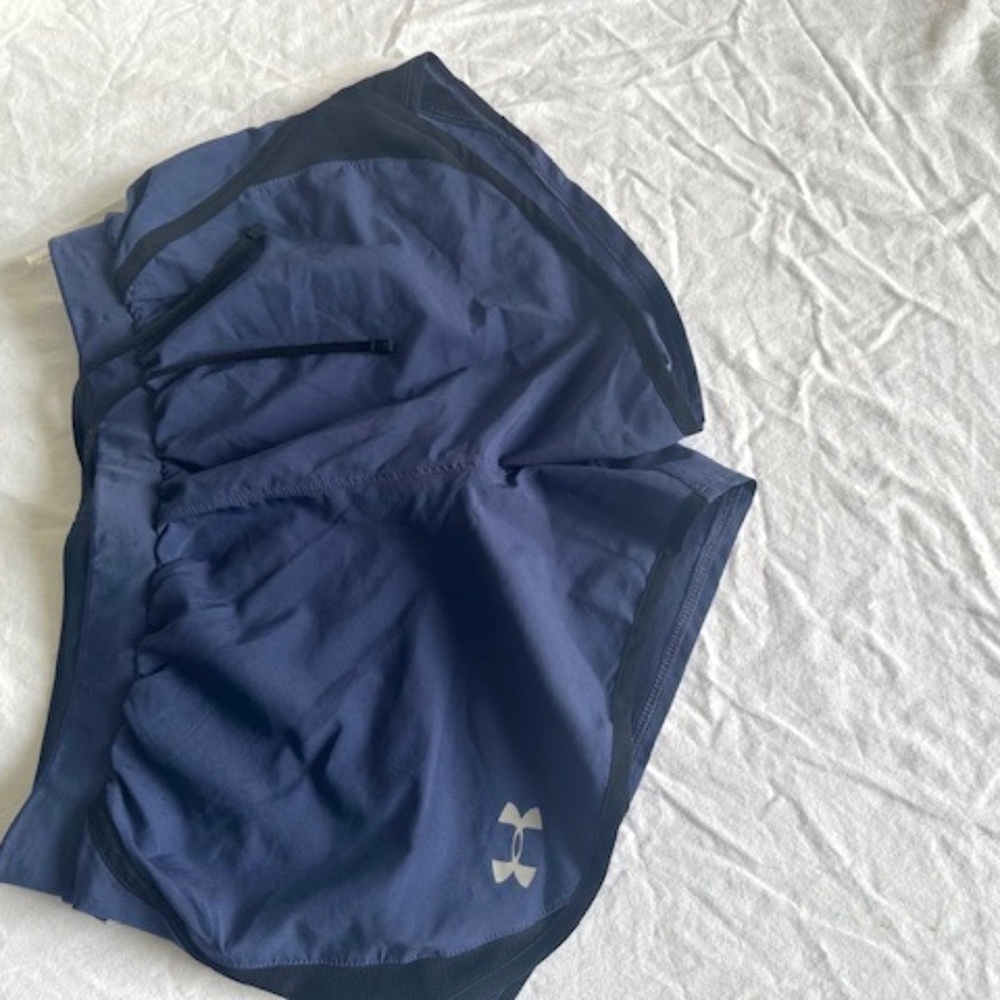 Women's Under Armour running shorts.   Never worn.  Size Medium